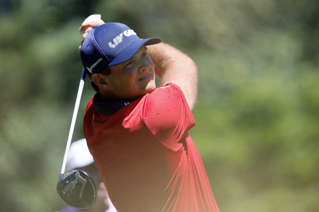 Jun 30, 2022; Portland, Oregon, USA; Patrick Reed watches his drive on the second hole during the first round of the LIV Golf tournament at Pumpkin Ridge Golf Club. Mandatory Credit: Soobum Im-USA TODAY Sports