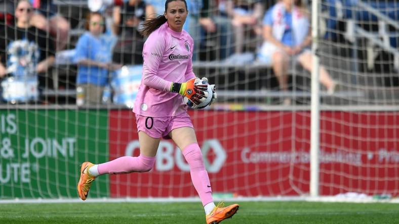 Jul 10, 2022; Bridgeview, Illinois, USA; North Carolina Courage goalkeeper Katelyn Rowland (0) controls the ball against the Chicago Red Stars during the second half at SeatGeek Stadium. Mandatory Credit: Daniel Bartel-USA TODAY Sports