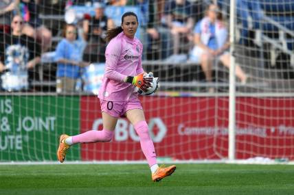 Jul 10, 2022; Bridgeview, Illinois, USA; North Carolina Courage goalkeeper Katelyn Rowland (0) controls the ball against the Chicago Red Stars during the second half at SeatGeek Stadium. Mandatory Credit: Daniel Bartel-USA TODAY Sports