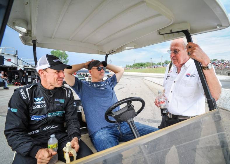 NASCAR champion Matt Kenseth, business manager Adrian Parker and the Rev. Dale Grubba talk on pit road before the ARCA Midwest Tour Gandrud 250 Tuesday, August 2, 2022, at Wisconsin International Raceway in Kaukauna.

Kaukauna