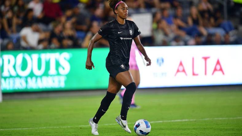 Aug 10, 2022; Los Angeles, CA, USA; Angel City FC defender Allyson Swaby (25) controls the ball against Tigres UANL during the second half of an international friendly at Banc Of California Stadium. Mandatory Credit: Gary A. Vasquez-USA TODAY Sports