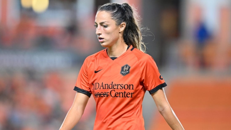 Aug 12, 2022; Houston, Texas, USA; Houston Dash forward Ryan Gareis (21) reacts to a play during the second half against Racing Louisville FC at PNC Stadium. Mandatory Credit: Maria Lysaker-USA TODAY Sports