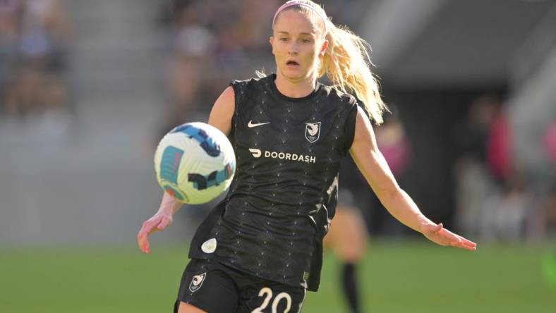 Aug 14, 2022; Los Angeles, California, USA; Angel City FC forward Tyler Lussi (20) looks to control the ball in the first half against the Chicago Red Stars at Banc of California Stadium. Mandatory Credit: Jayne Kamin-Oncea-USA TODAY Sports