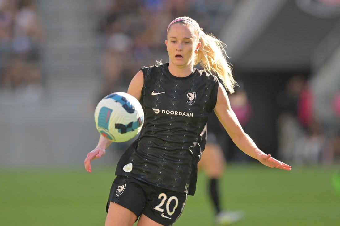 Aug 14, 2022; Los Angeles, California, USA; Angel City FC forward Tyler Lussi (20) looks to control the ball in the first half against the Chicago Red Stars at Banc of California Stadium. Mandatory Credit: Jayne Kamin-Oncea-USA TODAY Sports