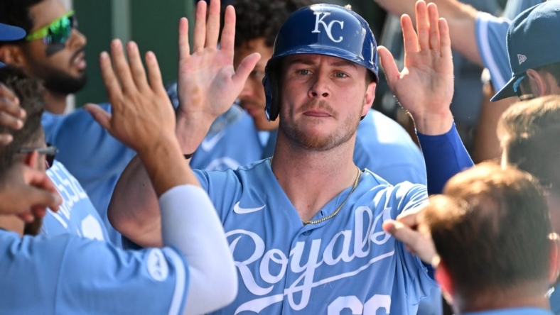 Aug 22, 2022; Kansas City, Missouri, USA;  Kansas City Royals designated hitter Ryan O'Hearn (66) celebrates after scoring a run in the dugout during the eighth inning against the Chicago White Sox at Kauffman Stadium. Mandatory Credit: Peter Aiken-USA TODAY Sports