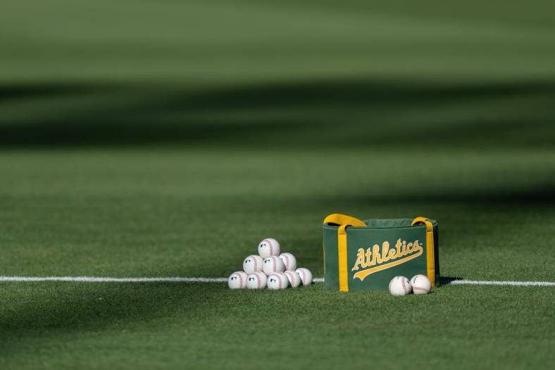 Aug 22, 2022; Oakland, California, USA; General view of the baseballs during batting practice between the Oakland Athletics and the Miami Marlins at RingCentral Coliseum. Mandatory Credit: Stan Szeto-USA TODAY Sports