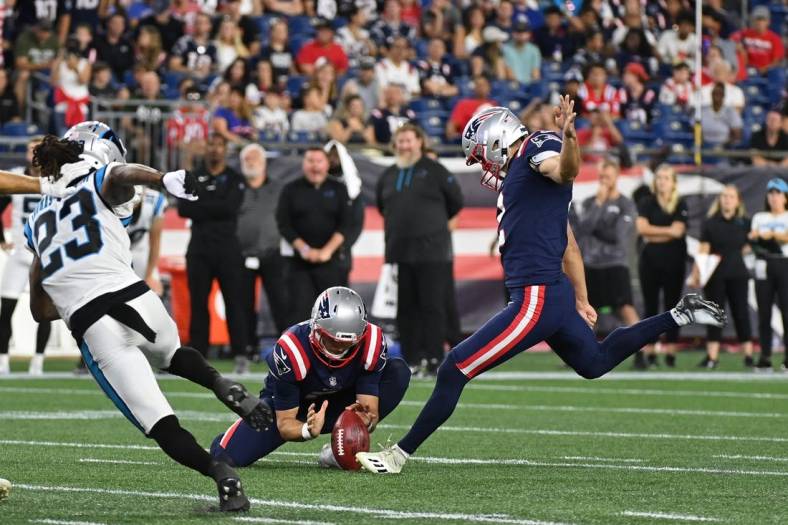 Aug 19, 2022; Foxborough, Massachusetts, USA; New England Patriots place kicker Tristan Vizcaino (2) kicks a field goal during the second half of a preseason game against the Carolina Panthers at Gillette Stadium. Mandatory Credit: Eric Canha-USA TODAY Sports