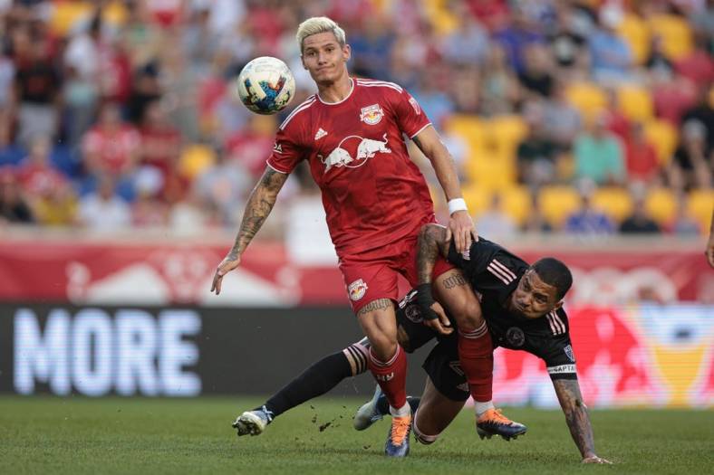 Aug 27, 2022; Harrison, New Jersey, USA; New York Red Bulls forward Patryk Klimala (9) battles for the ball with Inter Miami midfielder Gregore (26) during the first half at Red Bull Arena. Mandatory Credit: Vincent Carchietta-USA TODAY Sports