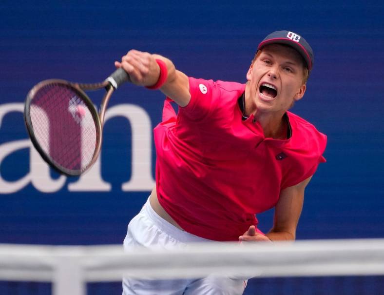 Sept 3, 2022; Flushing, NY, USA;  Jenson Brooksby of the USA hits to Carlos Alcaraz of Spain on day six of the 2022 U.S. Open tennis tournament at USTA Billie Jean King National Tennis Center. Mandatory Credit: Robert Deutsch-USA TODAY Sports