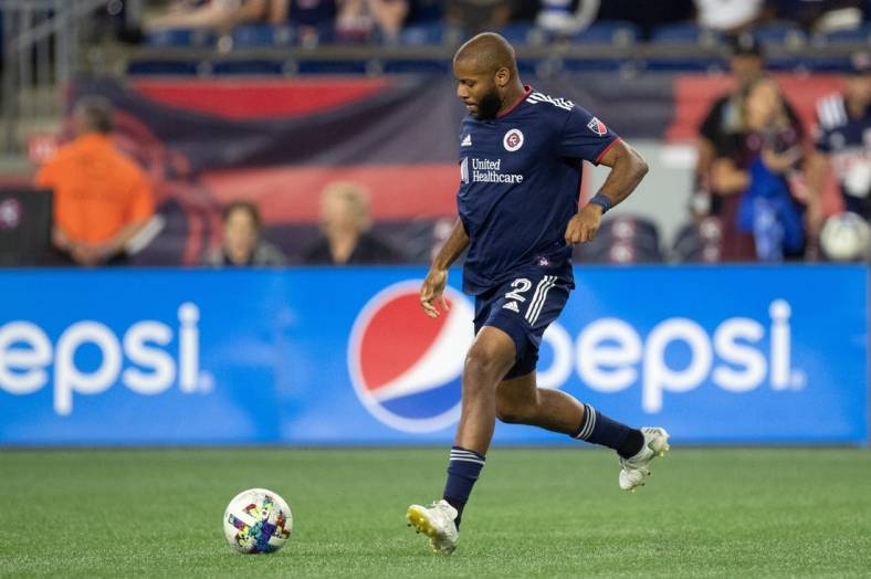 Aug 31, 2022; Foxborough, Massachusetts, USA; New England Revolution defender Andrew Farrell (2) passes the ball during the first half against the Chicago Fire FC at Gillette Stadium. Mandatory Credit: Paul Rutherford-USA TODAY Sports