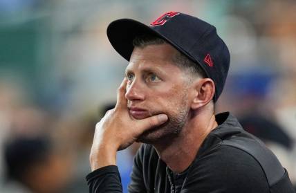 Sep 6, 2022; Kansas City, Missouri, USA; Cleveland Guardians assistant coach Kyle Hudson watches the action during the eighth inning against the Kansas City Royals at Kauffman Stadium. Mandatory Credit: Jay Biggerstaff-USA TODAY Sports