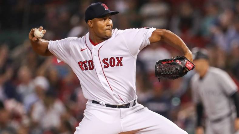 Sep 13, 2022; Boston, Massachusetts, USA; Boston Red Sox relief pitcher Jeurys Familia (31) delivers a pitch during the tenth inning against the New York Yankees at Fenway Park. Mandatory Credit: Paul Rutherford-USA TODAY Sports