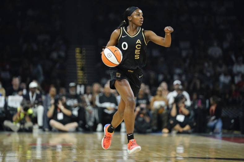 Sep 13, 2022; Las Vegas, Nevada, USA; Las Vegas Aces guard Jackie Young (0) dribbles the ball during the first quarter against the Connecticut Sun in game two of the WNBA Finals at Michelob Ultra Arena. Mandatory Credit: Lucas Peltier-USA TODAY Sports