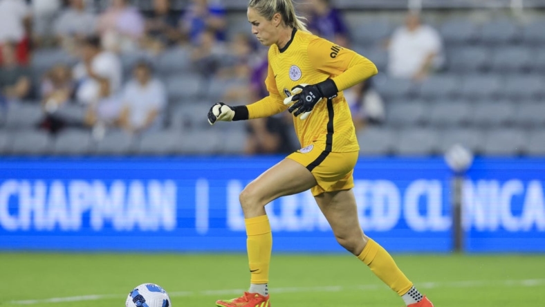 Sep 16, 2022; Louisville, Kentucky, USA; Racing Louisville FC goalkeeper Katie Lund (1) dribbles against Orlando Pride in the first half at Lynn Family Stadium. Mandatory Credit: Aaron Doster-USA TODAY Sports
