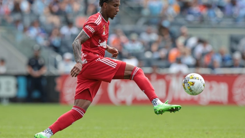 Sep 17, 2022; New York, New York, USA; New York Red Bulls defender Kyle Duncan (6) plays the ball against New York City FC during the second half at Yankee Stadium. Mandatory Credit: Vincent Carchietta-USA TODAY Sports