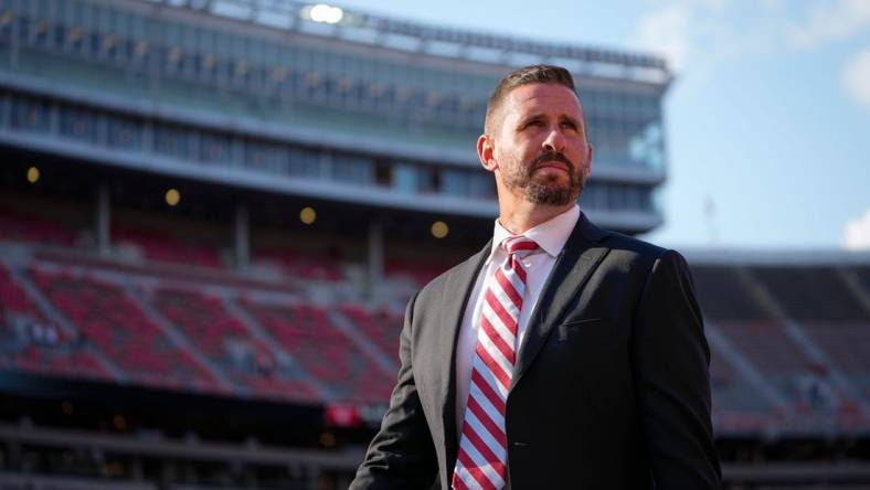 Sep 17, 2022; Columbus, Ohio, USA; Ohio State Buckeyes passing game coordinator Brian Hartline walks across the field prior to the NCAA Division I football game against the Toledo Rockets at Ohio Stadium. Mandatory Credit: Adam Cairns-The Columbus Dispatch

Ncaa Football Toledo Rockets At Ohio State Buckeyes