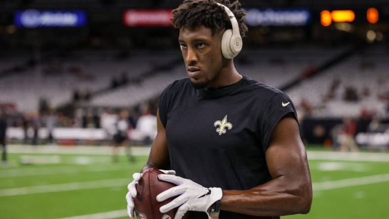 Sep 18, 2022; New Orleans, Louisiana, USA; New Orleans Saints wide receiver Michael Thomas (13) warms up before the game against the Tampa Bay Buccaneers at Caesars Superdome. Mandatory Credit: Stephen Lew-USA TODAY Sports