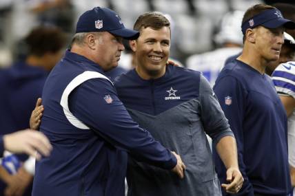 Sep 18, 2022; Arlington, Texas, USA; Dallas Cowboys head coach Mike McCarthy talks to offensive coordinator Kellen Moore before the game against the Cincinnati Bengals  at AT&T Stadium. Mandatory Credit: Tim Heitman-USA TODAY Sports