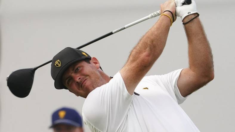 Sep 22, 2022; Charlotte, North Carolina, USA; International Team golfer Mito Pereira hits his tee shot on the 16th hole during the foursomes match play of the Presidents Cup golf tournament at Quail Hollow Club. Mandatory Credit: Peter Casey-USA TODAY Sports