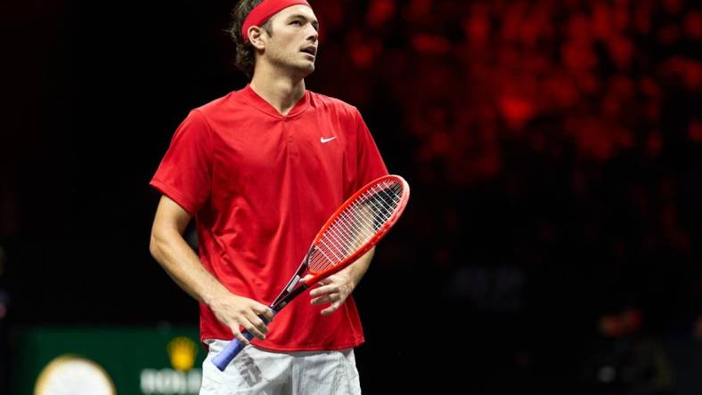 Sep 24, 2022; London, United Kingdom;
Taylor Fritz (USA) reacts to a point against Cameron Norrie (GBR) in a Laver Cup singles match.  Mandatory Credit: Peter van den Berg-USA TODAY Sports