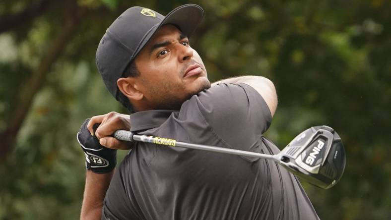 Sep 25, 2022; Charlotte, North Carolina, USA; International Team golfer Sebastian Munoz hits his tee shot on the 17th hole during the singles match play of the Presidents Cup golf tournament at Quail Hollow Club. Mandatory Credit: Peter Casey-USA TODAY Sports