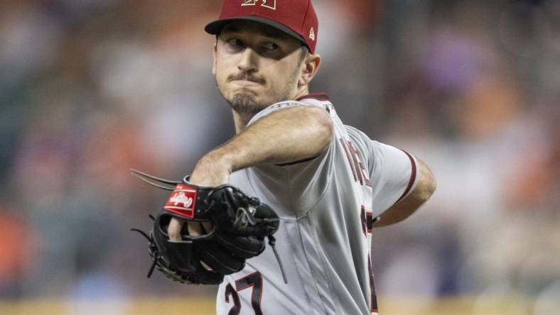 Sep 27, 2022; Houston, Texas, USA; Arizona Diamondbacks starting pitcher Zach Davies (27) pitches against the Houston Astros  in the second inning at Minute Maid Park. Mandatory Credit: Thomas Shea-USA TODAY Sports