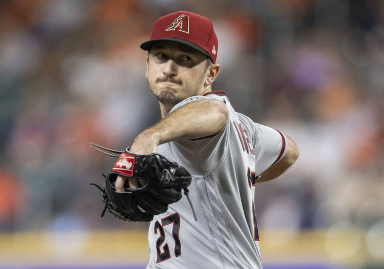 Sep 27, 2022; Houston, Texas, USA; Arizona Diamondbacks starting pitcher Zach Davies (27) pitches against the Houston Astros  in the second inning at Minute Maid Park. Mandatory Credit: Thomas Shea-USA TODAY Sports