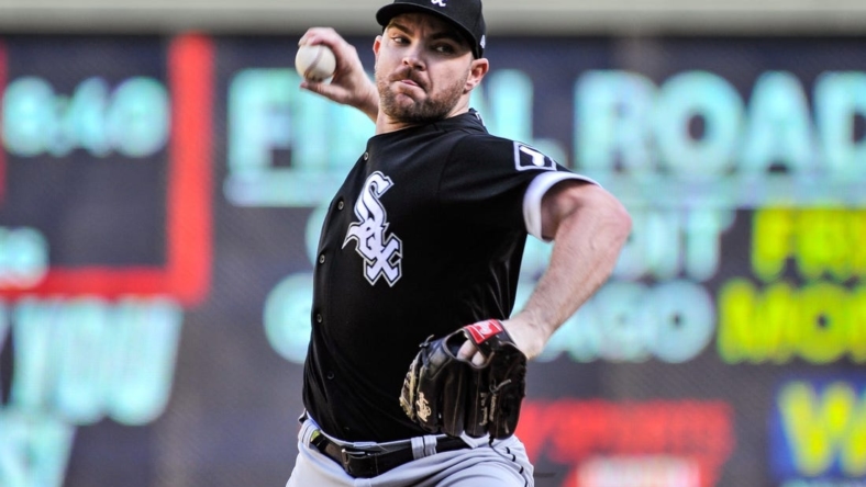 Sep 29, 2022; Minneapolis, Minnesota, USA; Chicago White Sox relief pitcher Liam Hendriks (31) throws a pitch against the Minnesota Twins during the ninth inning at Target Field. Mandatory Credit: Jeffrey Becker-USA TODAY Sports