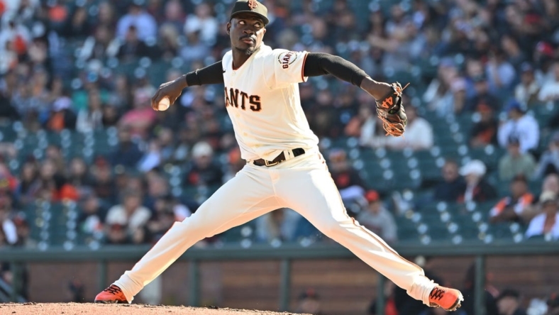 Oct 1, 2022; San Francisco, California, USA; San Francisco Giants relief pitcher Yunior Marte (74) throws against the Arizona Diamondbacks during the eighth inning at Oracle Park. Mandatory Credit: Robert Edwards-USA TODAY Sports