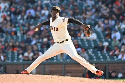 Oct 1, 2022; San Francisco, California, USA; San Francisco Giants relief pitcher Yunior Marte (74) throws against the Arizona Diamondbacks during the eighth inning at Oracle Park. Mandatory Credit: Robert Edwards-USA TODAY Sports