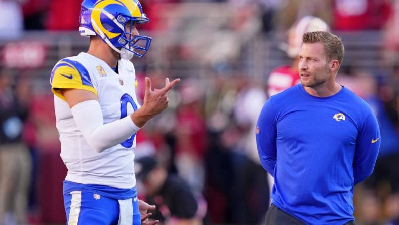 Oct 3, 2022; Santa Clara, California, USA; Los Angeles Rams quarterback Matthew Stafford (left) and head coach Sean McVay talk during warmups before the game against the San Francisco 49ers at Levi's Stadium. Mandatory Credit: Kyle Terada-USA TODAY Sports