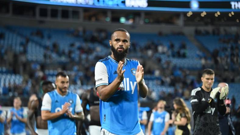 Oct 5, 2022; Charlotte, North Carolina, USA; Charlotte FC defender Anton Walkes (5) acknowledges fans after their tie against Columbus Crew at Bank of America Stadium. Mandatory Credit: Griffin Zetterberg-USA TODAY Sports