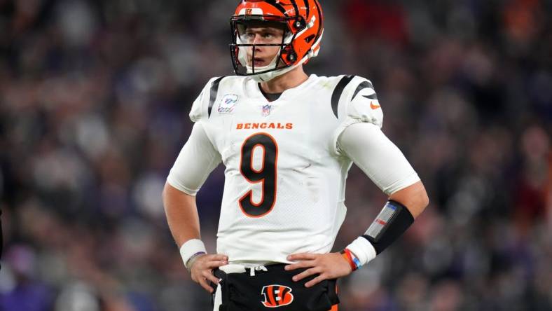 Cincinnati Bengals quarterback Joe Burrow (9) looks up at the scoreboard between plays in the fourth quarter during an NFL Week 5 game against the Baltimore Ravens, Sunday, Oct. 9, 2022, at M&T Bank Stadium in Baltimore.

Nfl Cincinnati Bengals At Baltimore Ravens Oct 9 0333