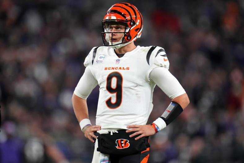 Cincinnati Bengals quarterback Joe Burrow (9) looks up at the scoreboard between plays in the fourth quarter during an NFL Week 5 game against the Baltimore Ravens, Sunday, Oct. 9, 2022, at M&T Bank Stadium in Baltimore.

Nfl Cincinnati Bengals At Baltimore Ravens Oct 9 0333
