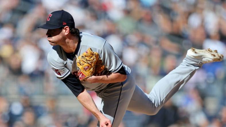 Oct 14, 2022; Bronx, New York, USA; Cleveland Guardians starting pitcher Shane Bieber (57) pitches against the New York Yankees during the third inning in game two of the ALDS for the 2022 MLB Playoffs at Yankee Stadium. Mandatory Credit: Brad Penner-USA TODAY Sports