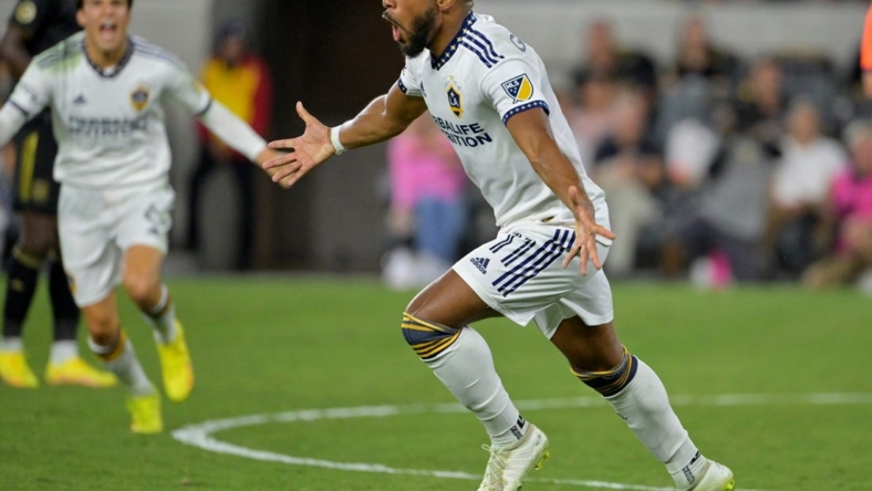 Oct 20, 2022; Los Angeles, California, US; Los Angeles Galaxy midfielder Samuel Grandsir (11) celebrates after during the first half of the MLS Cup Playoff semifinal against Los Angeles FC at Banc Of California Stadium. Mandatory Credit: Jayne Kamin-Oncea-USA TODAY Sports