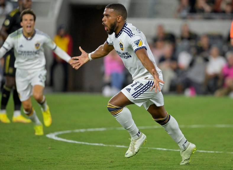 Oct 20, 2022; Los Angeles, California, US; Los Angeles Galaxy midfielder Samuel Grandsir (11) celebrates after during the first half of the MLS Cup Playoff semifinal against Los Angeles FC at Banc Of California Stadium. Mandatory Credit: Jayne Kamin-Oncea-USA TODAY Sports