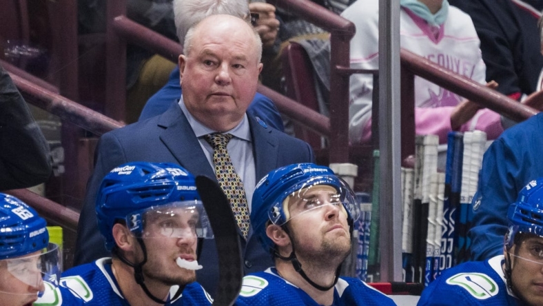 Oct 24, 2022; Vancouver, British Columbia, CAN; Vancouver Canucks head coach Bruce Boudreau on the bench against Carolina Hurricanes in the first period at Rogers Arena. Mandatory Credit: Bob Frid-USA TODAY Sports