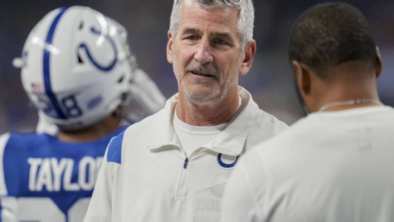 Oct 30, 2022; Indianapolis, Indiana, USA; Indianapolis Colts head coach Frank Reich talks on the field Sunday, Oct. 30, 2022, before a game against the Washington Commanders at Indianapolis Colts at Lucas Oil Stadium in Indianapolis. Mandatory Credit: Max Gersh/IndyStar-USA TODAY Sports