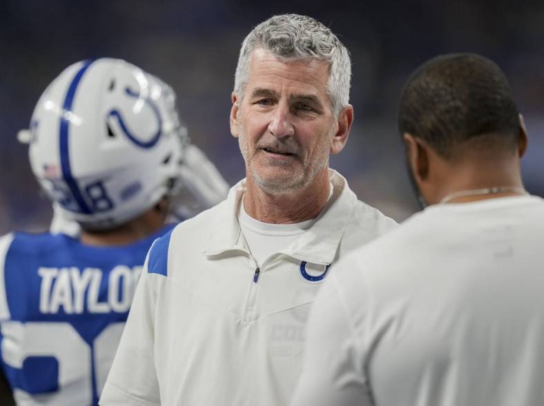 Oct 30, 2022; Indianapolis, Indiana, USA; Indianapolis Colts head coach Frank Reich talks on the field Sunday, Oct. 30, 2022, before a game against the Washington Commanders at Indianapolis Colts at Lucas Oil Stadium in Indianapolis. Mandatory Credit: Max Gersh/IndyStar-USA TODAY Sports