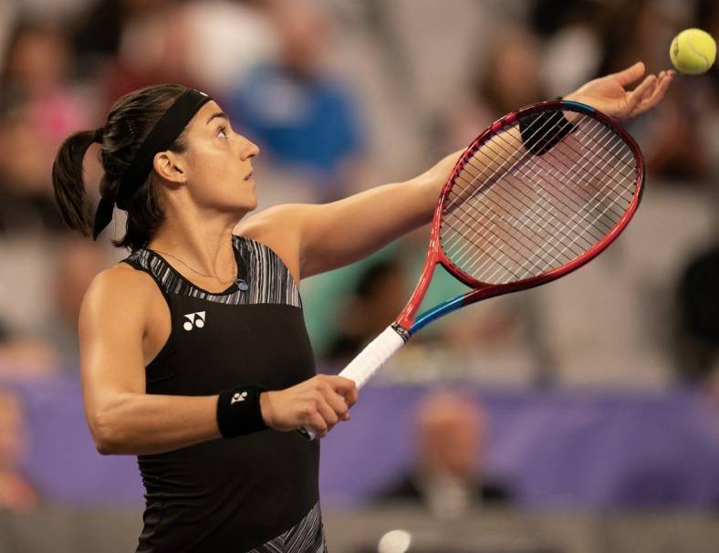 Nov 1, 2022; Forth Worth, TX, USA; Caroline Garcia (FRA) tosses the ball to serve during her match against Coco Gauff (USA) on day two of the WTA Finals at Dickies Arena. Mandatory Credit: Susan Mullane-USA TODAY Sports