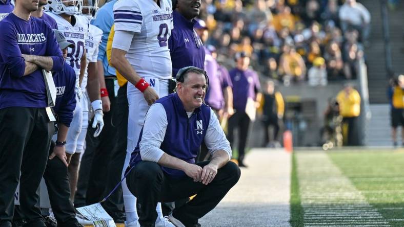 Oct 29, 2022; Iowa City, Iowa, USA; Northwestern Wildcats head coach Pat Fitzgerald looks on during the game against the Iowa Hawkeyes at Kinnick Stadium. Mandatory Credit: Jeffrey Becker-USA TODAY Sports