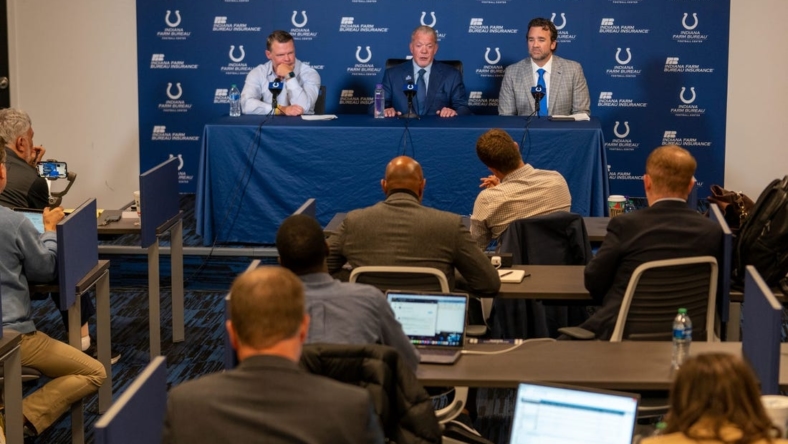 Media members talk with Chris Ballard, general manager, Jim Irsay, owner, and new interim head coach Jeff Saturday, on Monday, Nov. 7, 2022, during a press conference at the Colts headquarters in Indianapolis.