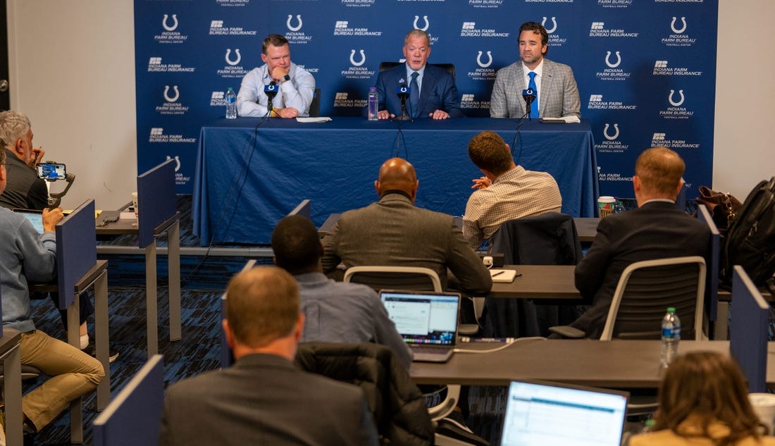 Media members talk with Chris Ballard, general manager, Jim Irsay, owner, and new interim head coach Jeff Saturday, on Monday, Nov. 7, 2022, during a press conference at the Colts headquarters in Indianapolis.