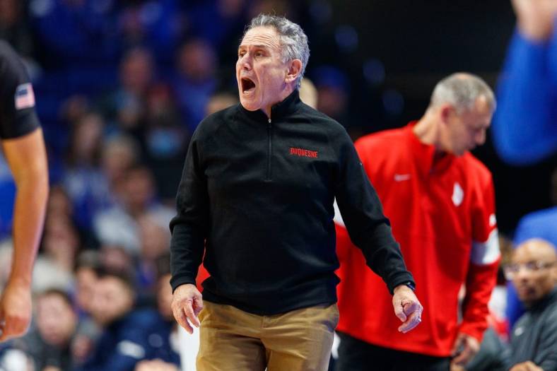 Nov 11, 2022; Lexington, Kentucky, USA; Duquesne Dukes head coach Keith Dambrot reacts during the first half against the Kentucky Wildcats at Rupp Arena at Central Bank Center. Mandatory Credit: Jordan Prather-USA TODAY Sports