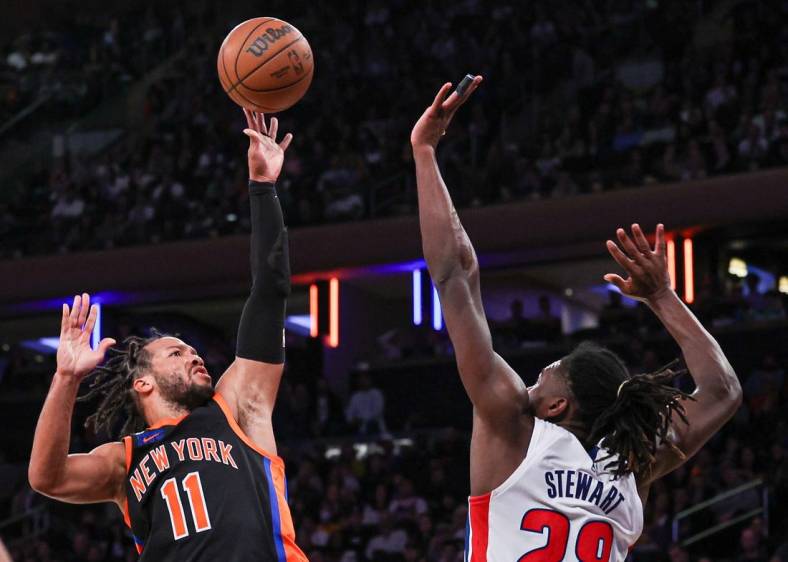 Nov 11, 2022; New York, New York, USA; New York Knicks guard Jalen Brunson (11) shoots the ball as Detroit Pistons center Isaiah Stewart (28) defends during the second half at Madison Square Garden. Mandatory Credit: Vincent Carchietta-USA TODAY Sports