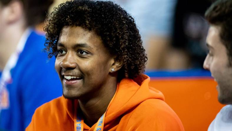 Florida Gators recruit Jaden Rashada smiles on the sideline during the second half against the Florida Gators at Steve Spurrier Field at Ben Hill Griffin Stadium in Gainesville, FL on Saturday, November 12, 2022. [Matt Pendleton/Gainesville Sun]

Ncaa Football Florida Gators Vs South Carolina Gamecocks