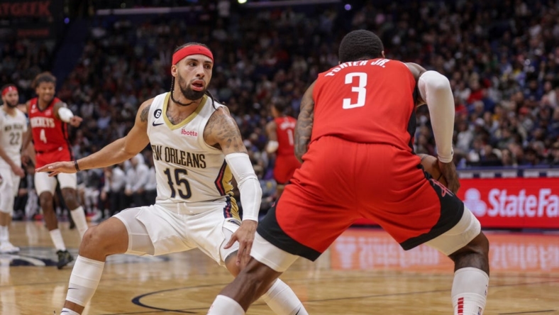 Nov 12, 2022; New Orleans, Louisiana, USA;  New Orleans Pelicans guard Jose Alvarado (15) guards Houston Rockets guard Kevin Porter Jr. (3) during the second half at Smoothie King Center. Mandatory Credit: Stephen Lew-USA TODAY Sports