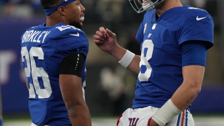 Saquon Barkley and Daniel Jones of the Giants in the second half. The Houston Texans at the New York Giants in a game played at MetLife Stadium in East Rutherford, NJ on November 13, 2022.

The Houston Texans Face The New York Giants In A Game Played At Metlife Stadium In East Rutherford Nj On November 13 2022