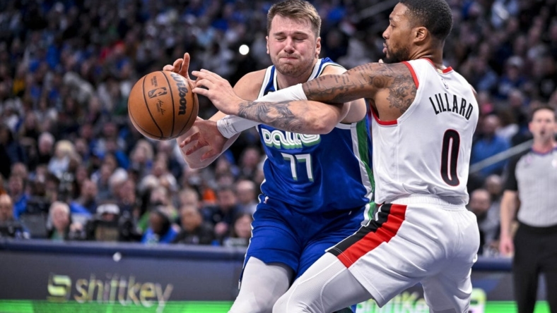 Nov 12, 2022; Dallas, Texas, USA; Dallas Mavericks guard Luka Doncic (77) and Portland Trail Blazers guard Damian Lillard (0) in action during the game between the Dallas Mavericks and the Portland Trail Blazers at the American Airlines Center. Mandatory Credit: Jerome Miron-USA TODAY Sports